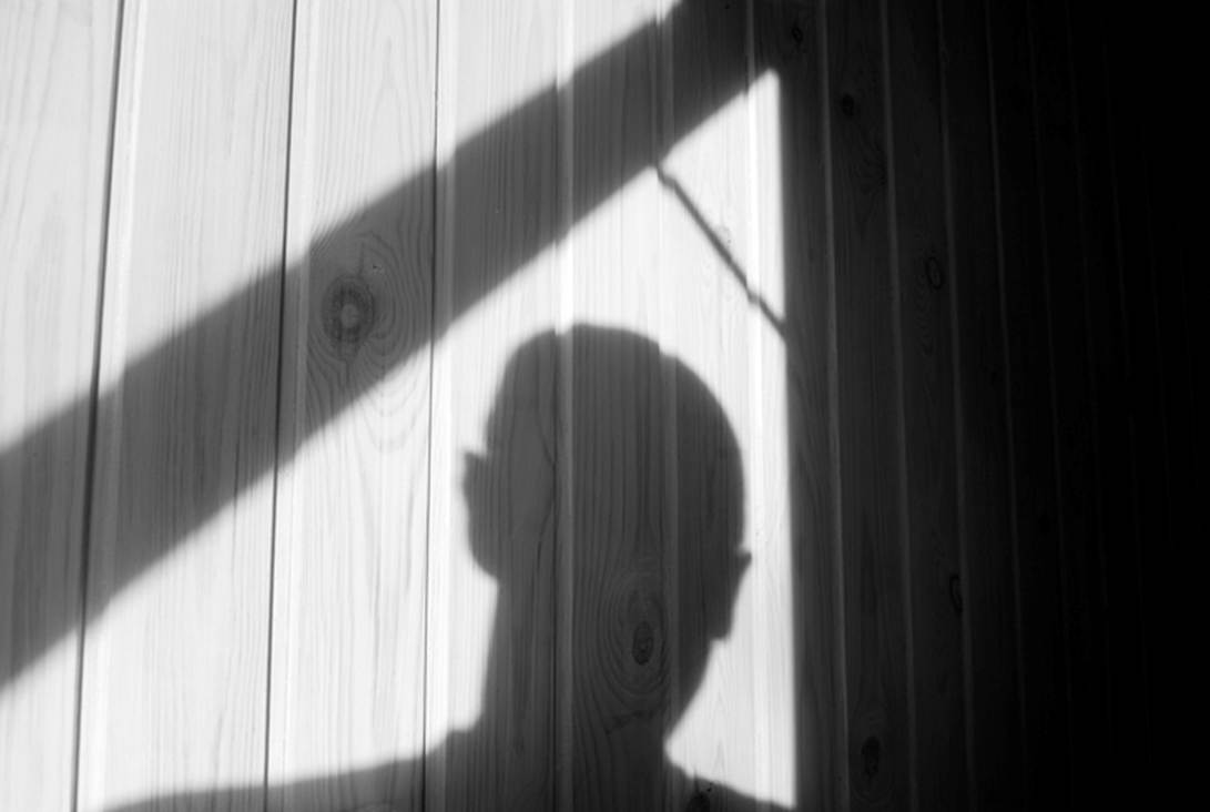 A shadow of a person's head

AI-generated content may be incorrect.